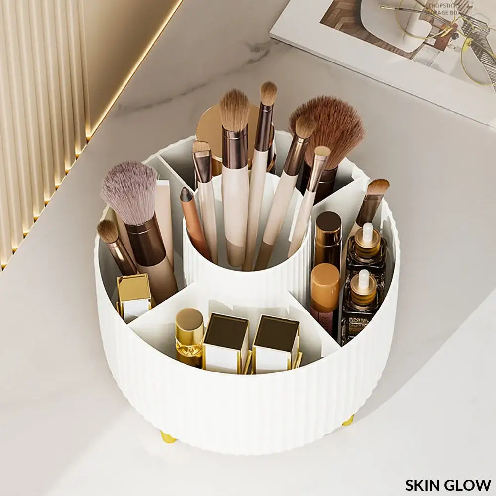 White circular rotating makeup desktop storage box with compartments for brushes and cosmetics