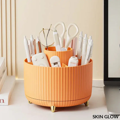 Peach ribbed circular organizer with compartments for a trendy rotating makeup desktop setup