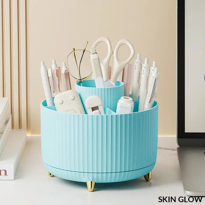 Turquoise ribbed circular organizer with gold feet for beauty tools in a Rotating Makeup Desktop