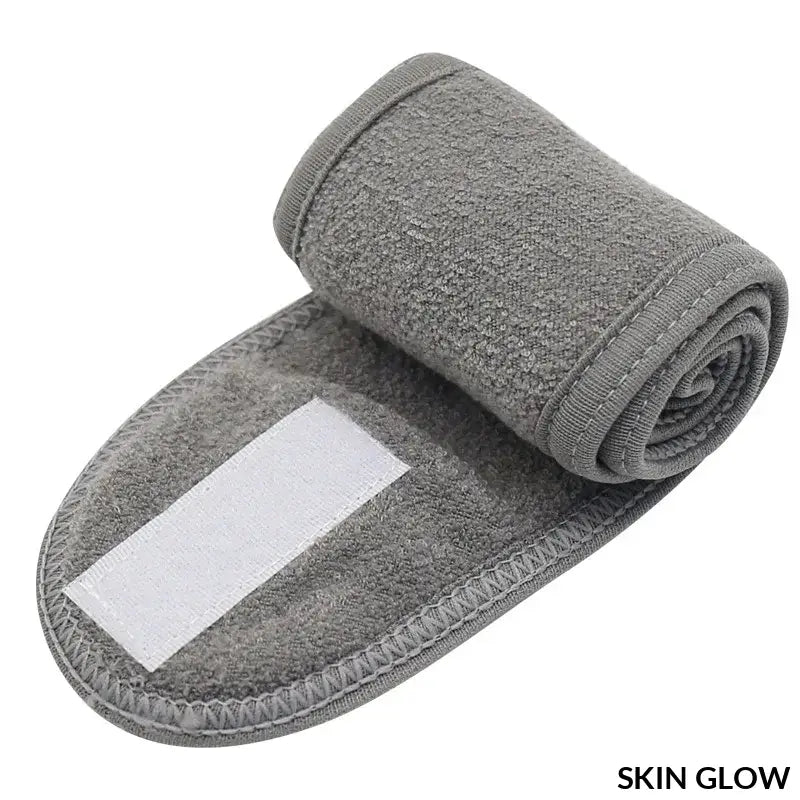 Gray terry cloth spa headband with white label patch for headband makeup accessories