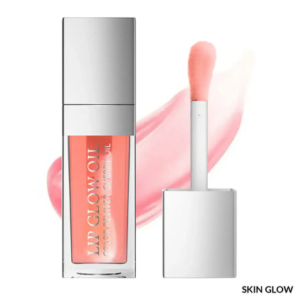 Peach lip oil gloss in a clear silver container with applicator wand for a perfect shine