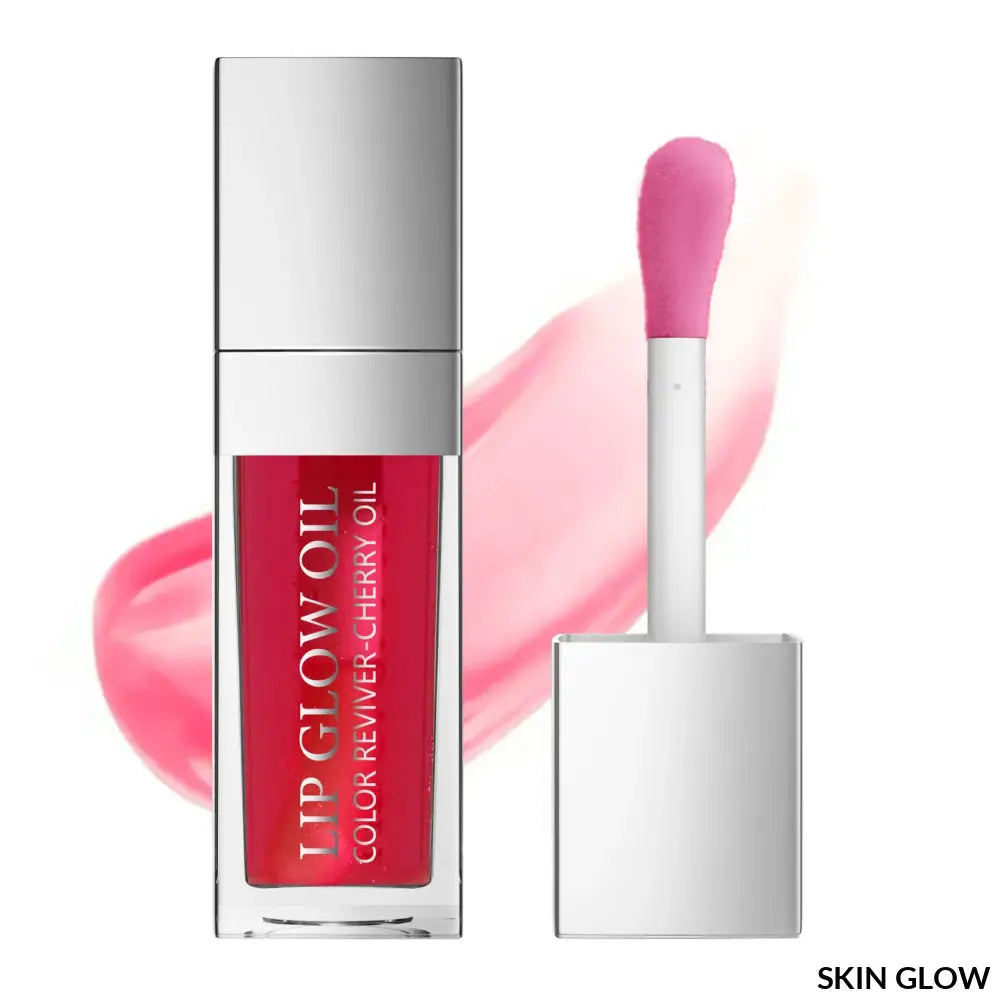 Pink lip oil gloss in a clear silver container with an applicator wand for easy use