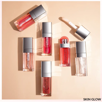 Collection of Lip Oil Gloss in red and pink shades with shiny silver caps