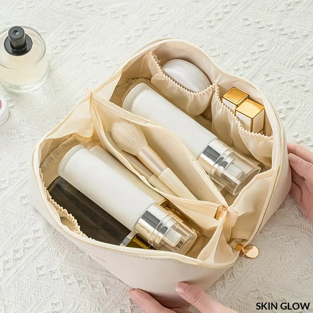 Cream-colored makeup organizer kit with skincare products in organized compartments