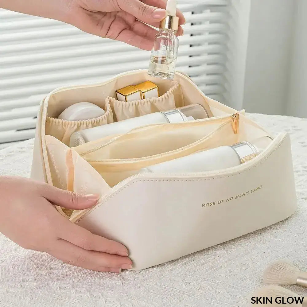 Cream-colored makeup organizer kit with compartments for easy beauty product storage