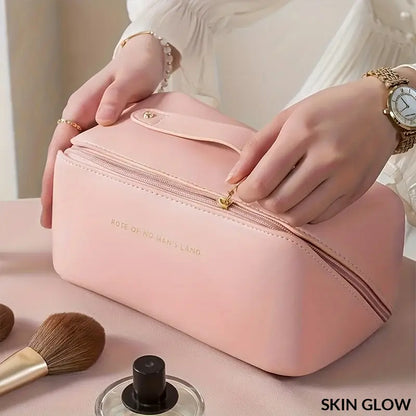 Pink leather cosmetic bag with gold zipper, perfect for your makeup organizer kit